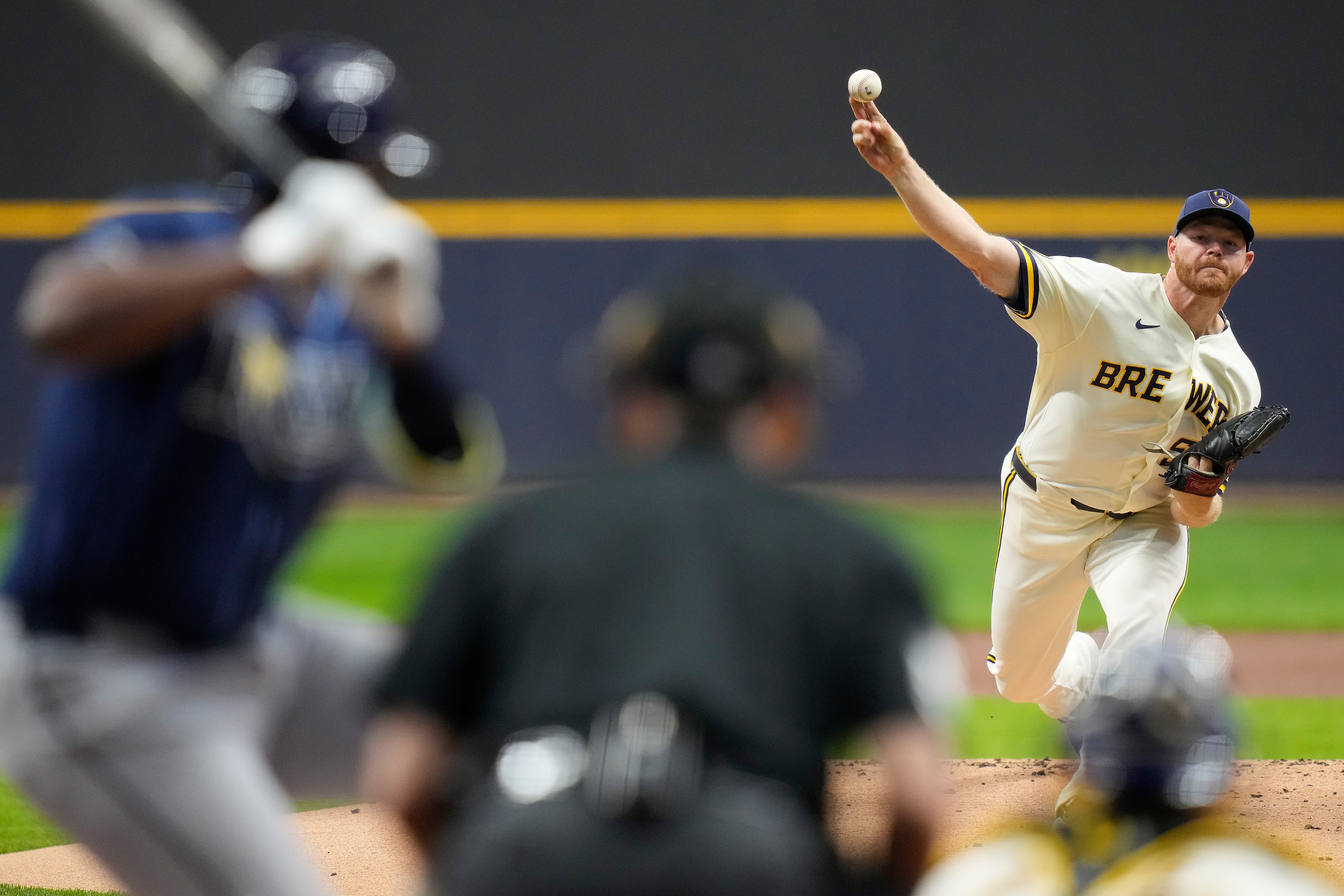Baseball players celebrating in the dugout
