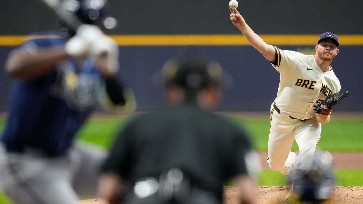 Baseball players celebrating in the dugout