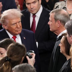 President Donald Trump greats Supreme Court Chief Justice John Roberts and Justices Elena Kagan, Brett Kavanaugh and Justice Amy Coney Barrett as he arrives for the State of the Union address during a Joint Session of Congress at the U.S. Capitol on February 24, 2026, in Washington, DC. Trump delivered his address days after the Supreme Court struck down the administration's tariff strategy and amid a U.S. military buildup in the Persian Gulf threatening Iran.