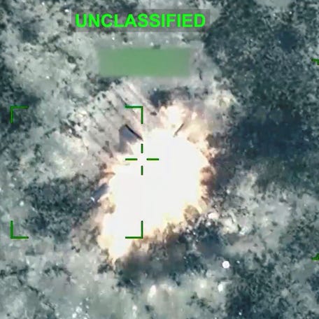 An explosion following what the U.S. Central Command says is a strike on an Iranian one-way attack drone at an unknown location, in this screengrab taken from a handout video released on March 22, 2026. CENTCOM via X/Handout via REUTERS THIS IMAGE HAS BEEN SUPPLIED BY A THIRD PARTY. OVERLAYS AND BLURRING FROM SOURCE. MANDATORY CREDIT. Verification: - Location and date could not verified - No older version of the video was found posted   before March 22