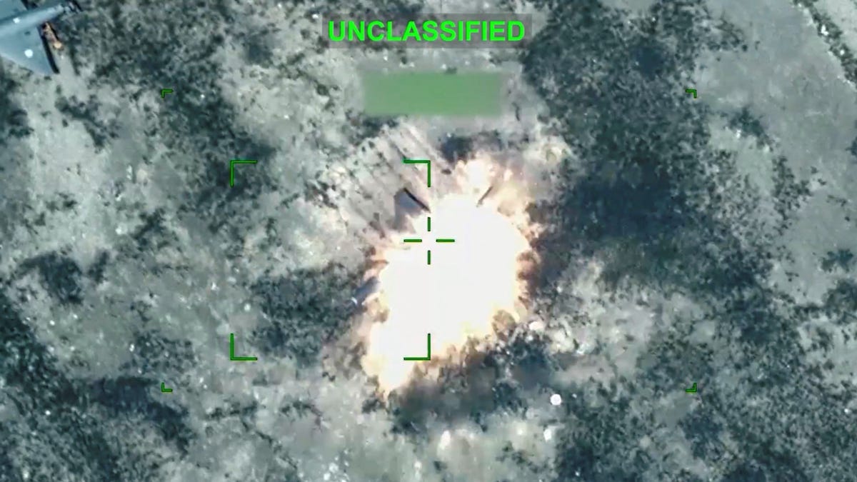 An explosion following what the U.S. Central Command says is a strike on an Iranian one-way attack drone at an unknown location, in this screengrab taken from a handout video released on March 22, 2026. CENTCOM via X/Handout via REUTERS THIS IMAGE HAS BEEN SUPPLIED BY A THIRD PARTY. OVERLAYS AND BLURRING FROM SOURCE. MANDATORY CREDIT. Verification: - Location and date could not verified - No older version of the video was found posted before   March 22