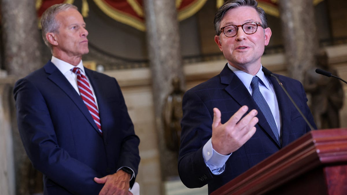 U.S. House Speaker Mike Johnson (R-LA) speaks next to Senate Majority Leader John Thune (R-SD) during a press conference on the third day of a partial shutdown of the federal government at the U.S. Capitol in Washington, D.C., U.S. October 3, 2025.