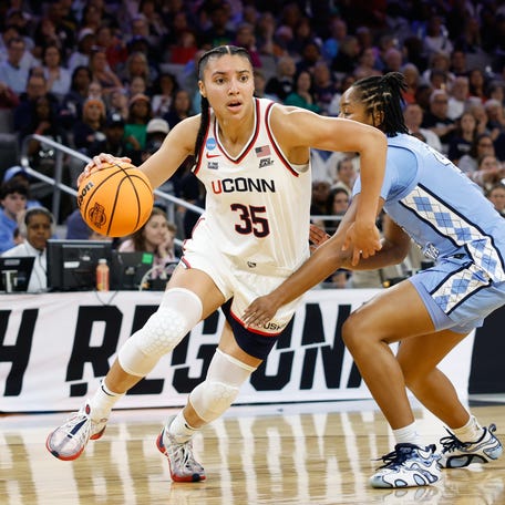 Mar 27, 2026; Fort Worth, TX, USA; UConn Huskies guard Azzi Fudd (35) drives to the basket against North Carolina Tar Heels guard Laila Hull (4) during the first half at Dickies Arena. Mandatory Credit: Chris Jones-Imagn Images
