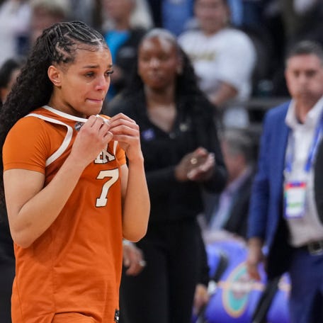Texas Longhorns guard Jordan Lee (7) walks off the court after losing to the UCLA Bruins during the second half of a semifinal of the Final Four of the women's 2026 NCAA Tournament at Mortgage Matchup Center.
