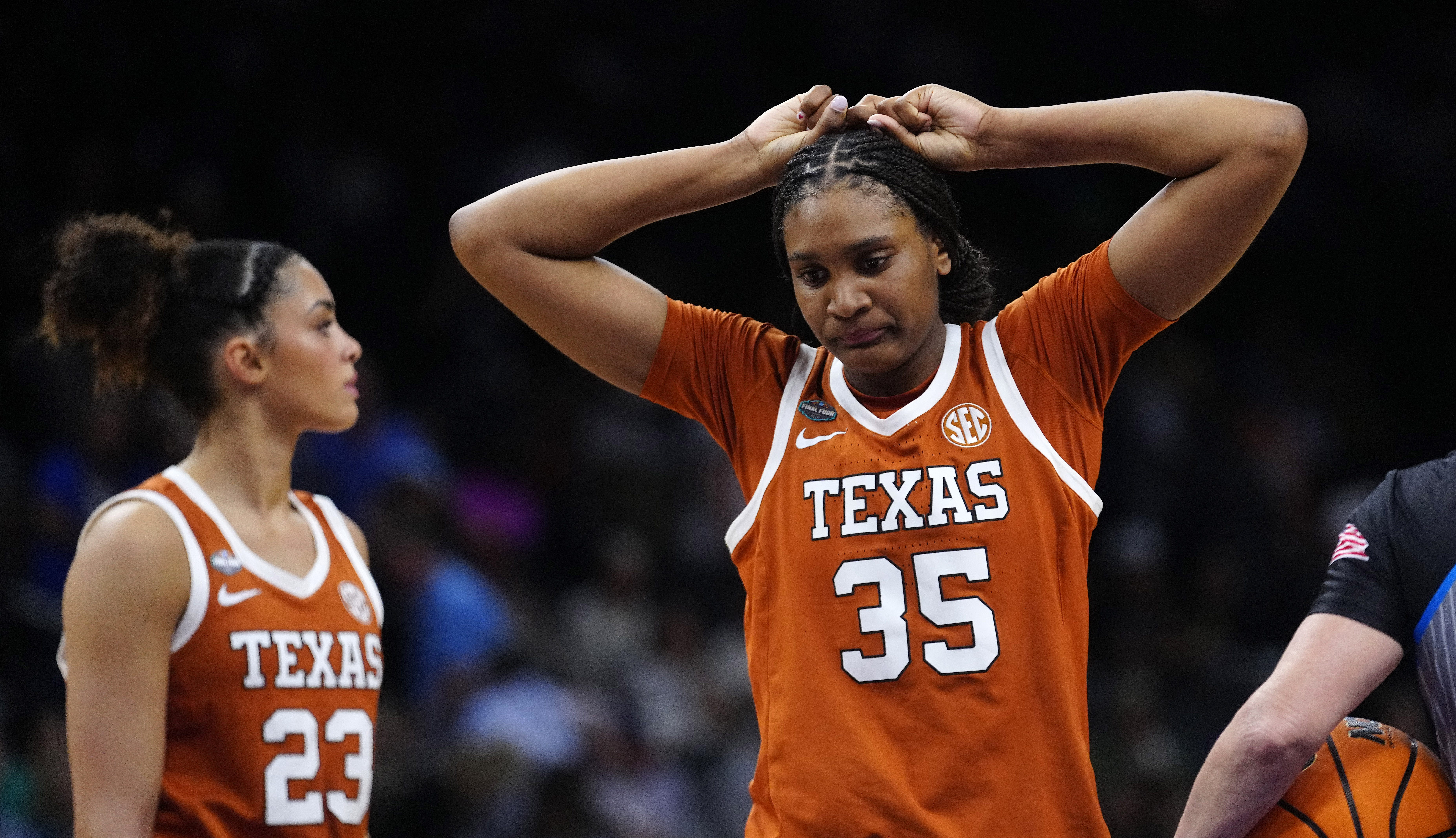 Texas' Madison Booker was emotional after a tough Final Four loss, but teammate Rori Harmon was quick to come to her defense.