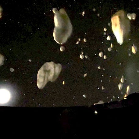An animated view iof the asteroid belt is projected during a class at the New Rochelle High School planetarium Nov. 25, 2025.