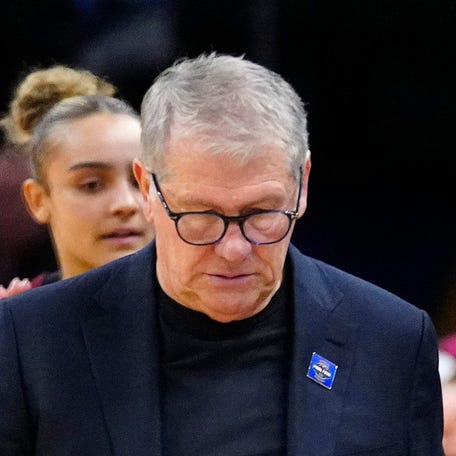 South Carolina head coach Dawn Staley (right) yells at Connecticut head coach Geno Auriemma at Mortgage Matchup Center during the Women's Final Four in Phoenix on April 3, 2026.