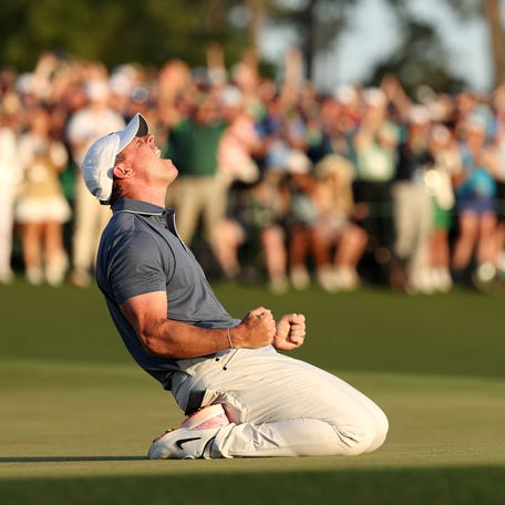 Rory McIlroy of Northern Ireland celebrates winning the 2025 Masters Tournament after the playoff hole on the 18th green during the final round of the 2025 Masters Tournament at Augusta National Golf Club on April 13, 2025 in Augusta, Georgia.