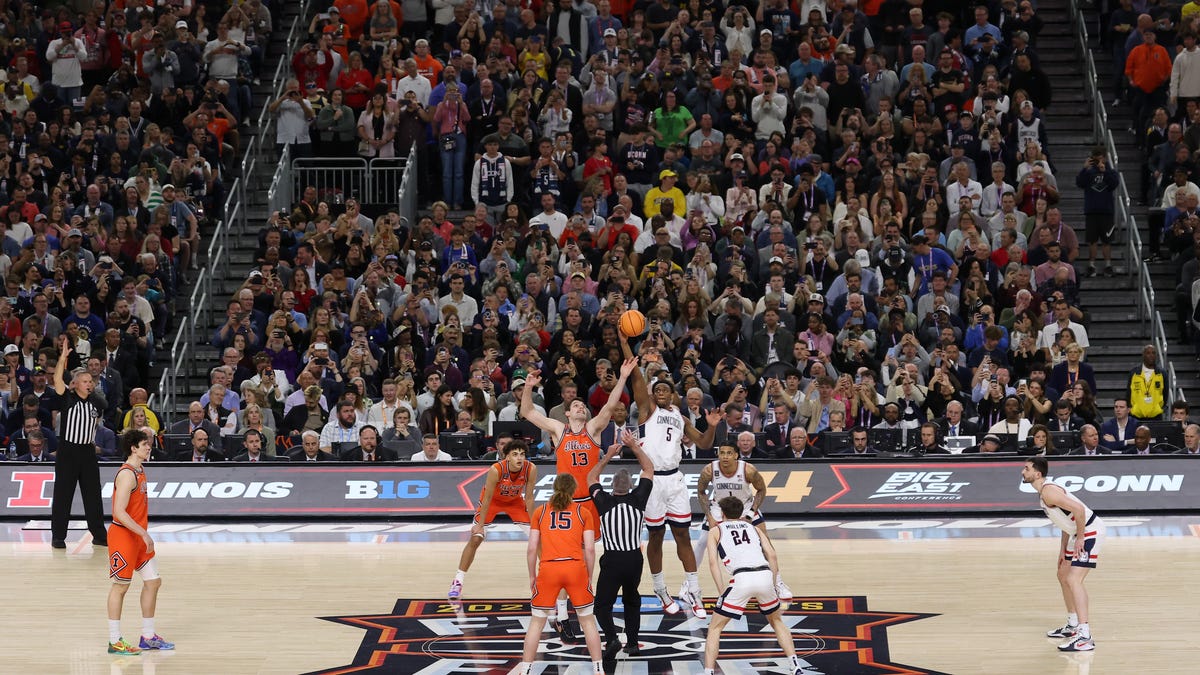 Photos capture the tension and emotion as Illinois faces UConn in the NCAA men’s basketball Final Four semifinal with a title game spot on the line.