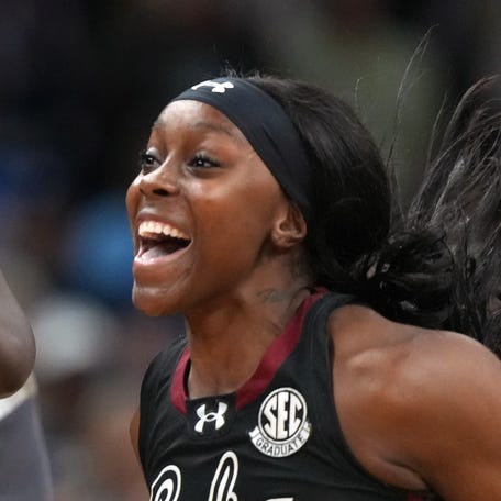 South Carolina players celebrate after defeating UConn in a semifinal of the Final Four of the Women's NCAA Tournament at Mortgage Matchup Center.
