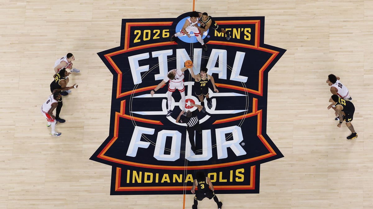 Photos capture the intensity as Arizona faces Michigan in the NCAA men’s basketball Final Four night semifinal with a championship berth at stake.