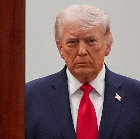 President Donald Trump arrives from the Blue Room to speak about the Iran war from the Cross Hall of the White House on Wednesday, April 1.