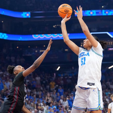 UCLA Bruins center Lauren Betts (51) shoots against South Carolina Gamecocks forward Joyce Edwards (8) during the NCAA championship game in Phoenix on April 5, 2026.