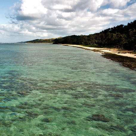 This photo taken on December 10, 2020 and released by Reef Explorer Fiji shows an aerial view of the Fiji's Coral Coast.