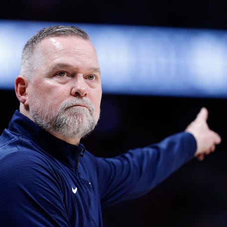 Apr 1, 2025; Denver, Colorado, USA; Denver Nuggets head coach Michael Malone in the second quarter against the Minnesota Timberwolves at Ball Arena. Mandatory Credit: Isaiah J. Downing-Imagn Images