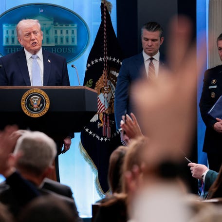 Reporters raise their hands to ask questions as U.S. President Donald Trump holds a press conference with U.S. Secretary of Defense Pete Hegseth and Chairman of the Joint Chiefs of Staff Gen. Dan Caine, in the James S. Brady Press Briefing Room at the White House in Washington, D.C., U.S., April 6, 2026. REUTERS/Evan Vucci