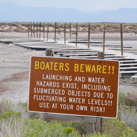 Docks at Utah’s Great Salt Lake sit far away from the water’s edge. The iconic lake has been shrinking for decades, but local officials, boosted by President Donald Trump, are hoping to refill it by 2034. This image was taken in September 2025.