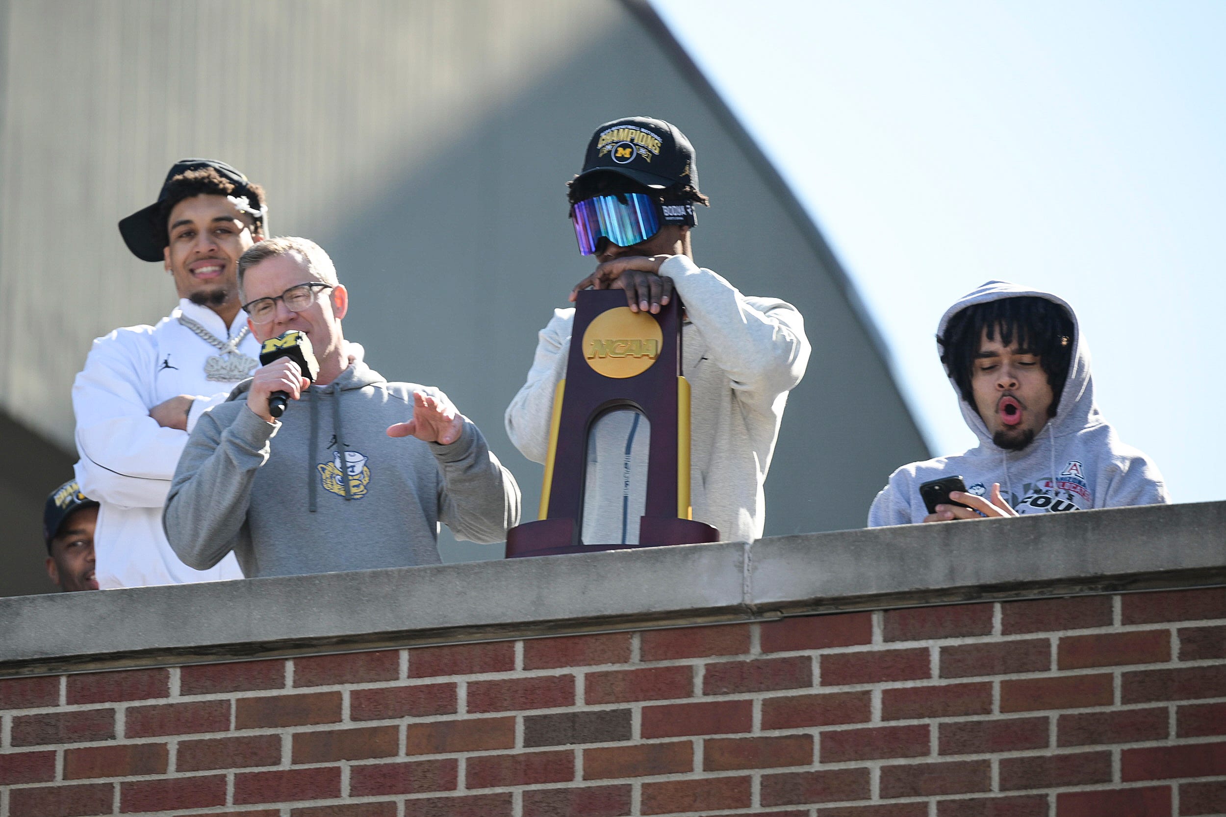 Fans welcoming Michigan team back home