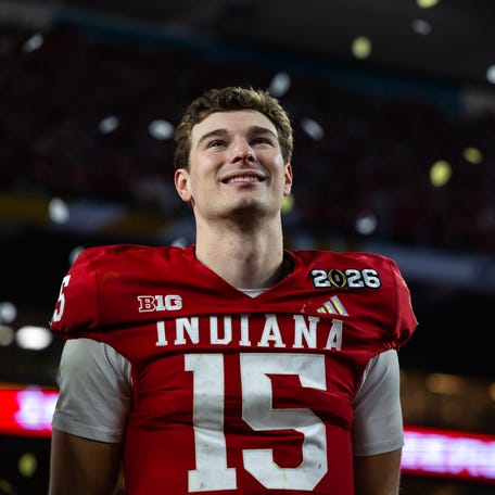 Jan 19, 2026; Miami Gardens, FL, USA; Indiana Hoosiers quarterback Fernando Mendoza (15) celebrates after defeating the Miami Hurricanes in the College Football Playoff National Championship game at Hard Rock Stadium. Mandatory Credit: Mark J. Rebilas-Imagn Images