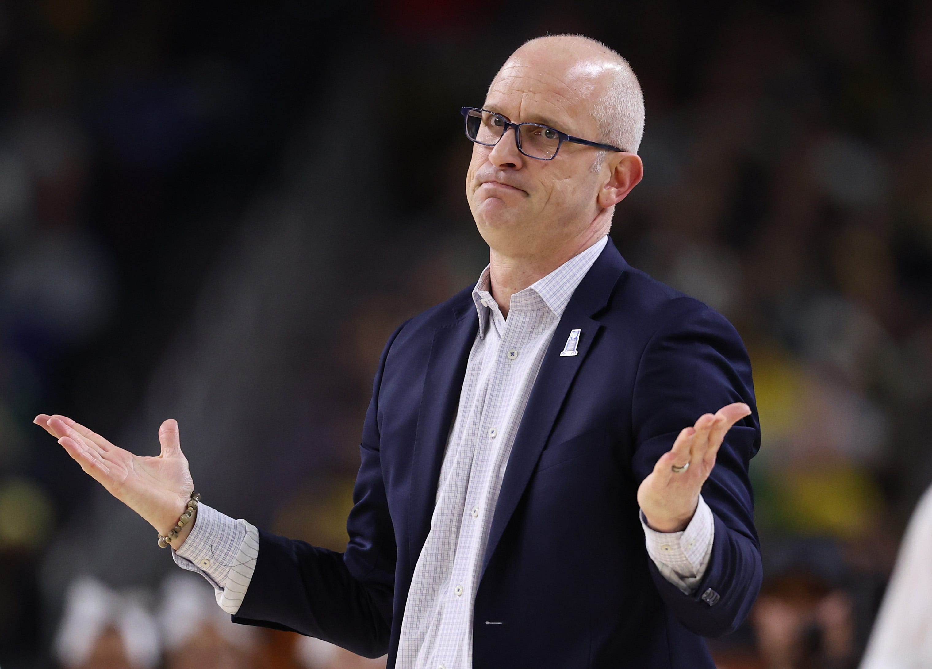 After his team's 69-63 loss to Michigan in the national championship game, UConn coach Dan Hurley praised the referees, despite a foul disparity: