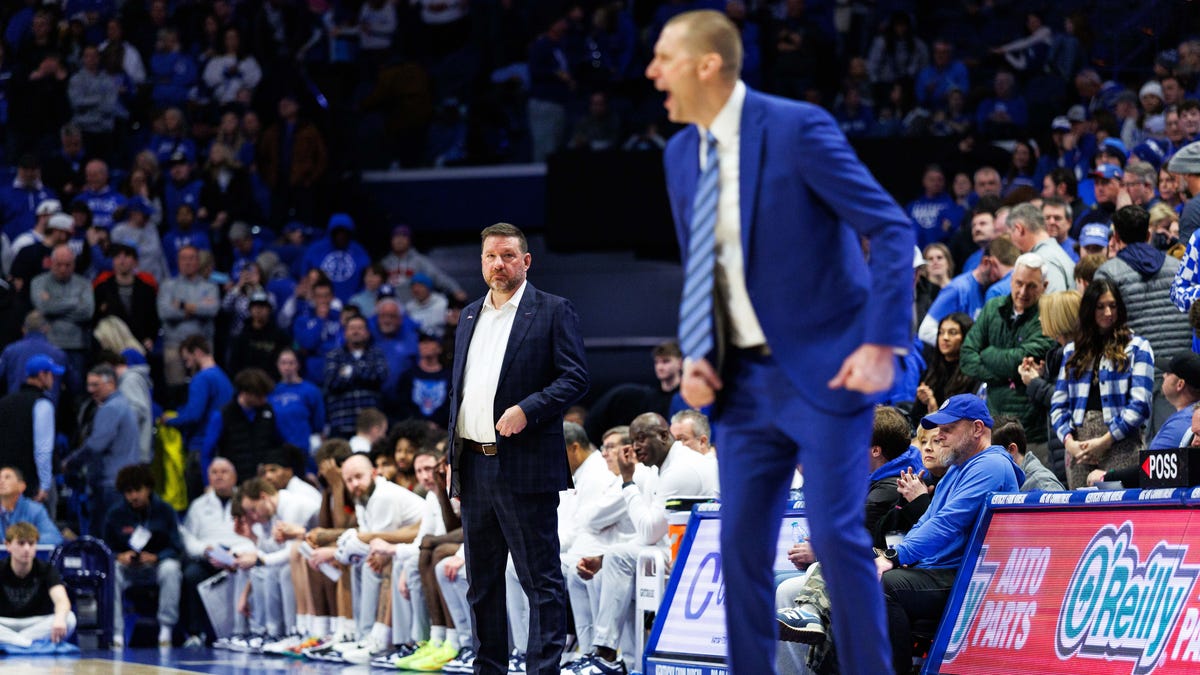 Jan 24, 2026; Lexington, Kentucky, USA; Mississippi Rebels head coach Chris Beard looks on as Kentucky Wildcats head coach Mark Pope yells to his players during the second half at Rupp Arena at Central Bank Center. Mandatory Credit: Jordan Prather-Imagn Images