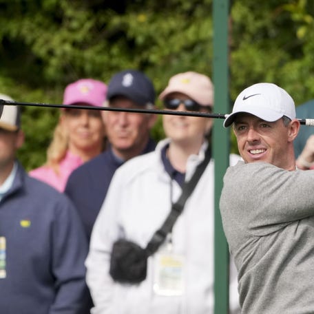 Apr 7, 2026; Augusta, Georgia, USA; Rory McIlroy tees off on no. 14 during a practice round for the Masters Tournament at Augusta National Golf Club. Mandatory Credit: Michael Madrid-Imagn Images