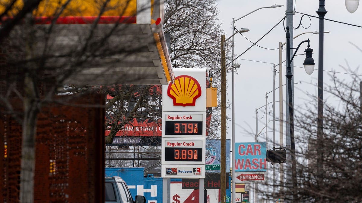A Shell gas station sign displays fuel prices along a street in Detroit on Tuesday, March 31, 2026.