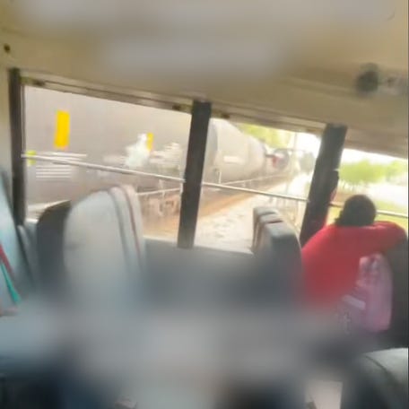 A school bus driver in Sumter County, Florida, was charged with reckless driving and 29 felony counts after ignoring warning lights and driving through a rail crossing, causing the bus to be clipped by a passing train on Thursday, April 2.