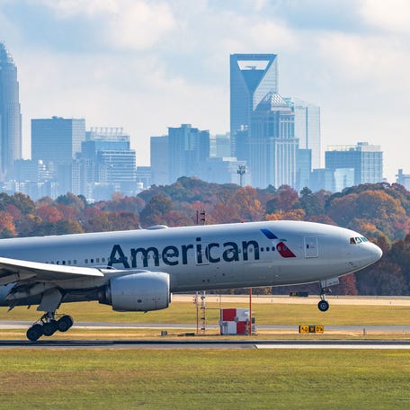 An American Airlines plane lands at Charlotte-Douglas International Airport (CLT) on Nov. 9, 2025 in Charlotte, North Carolina.