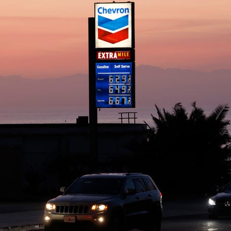 EL SEGUNDO, CALIFORNIA - APRIL 08: High gas prices are displayed at a Chevron gas station near the Pacific Ocean on April 8, 2026 in El Segundo, California. (Photo by Mario Tama/Getty Images)