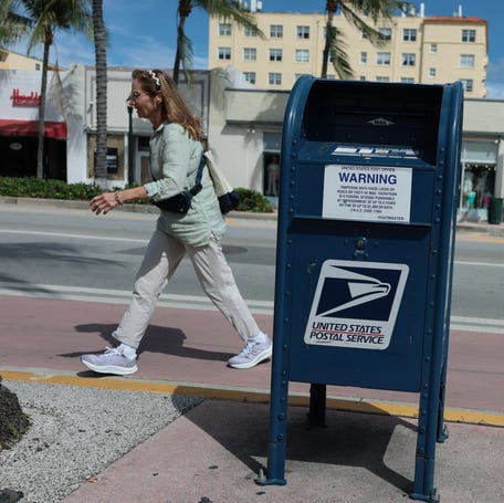 A mailbox sits on a street on March 19, 2026 in Miami Beach, Florida.