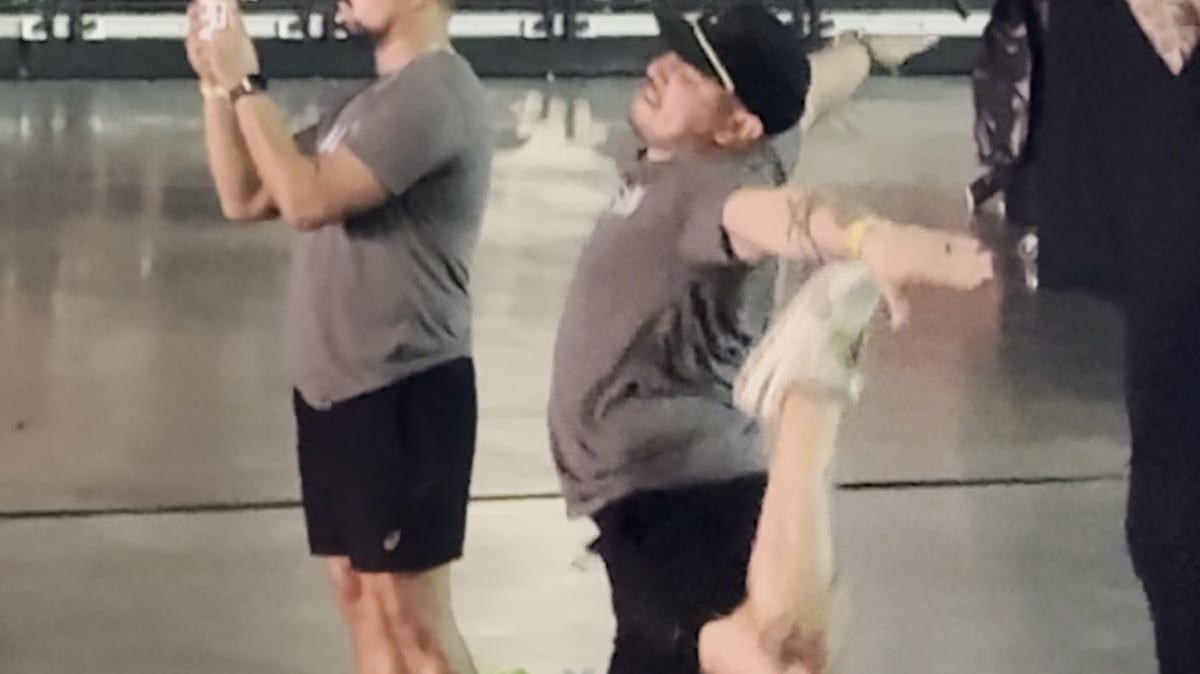 Watch cheer coach support team with sideline moves