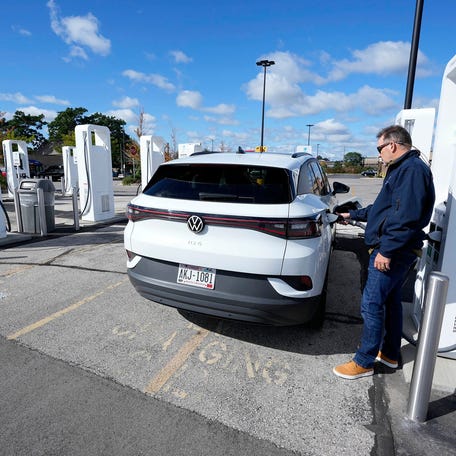 Steve Patton, of Milwaukee, connects his 2022 Volkswagen ID.4 electric vehicle to a high-speed charging network station for electric vehicles in the Walmart parking lot at 4140 W. Greenfield Ave. in West Milwaukee on Tuesday, Sept. 27, 2022. A new state program is helping to fund a buildout of a high-speed charging network for electric vehicles. There are six stations in Wisconsin that meet the program standards including this one in the Walmart parking lot.

MJS-EVcharging00p1