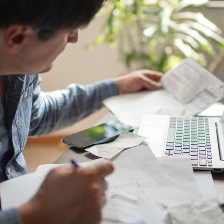 Man with financial documents