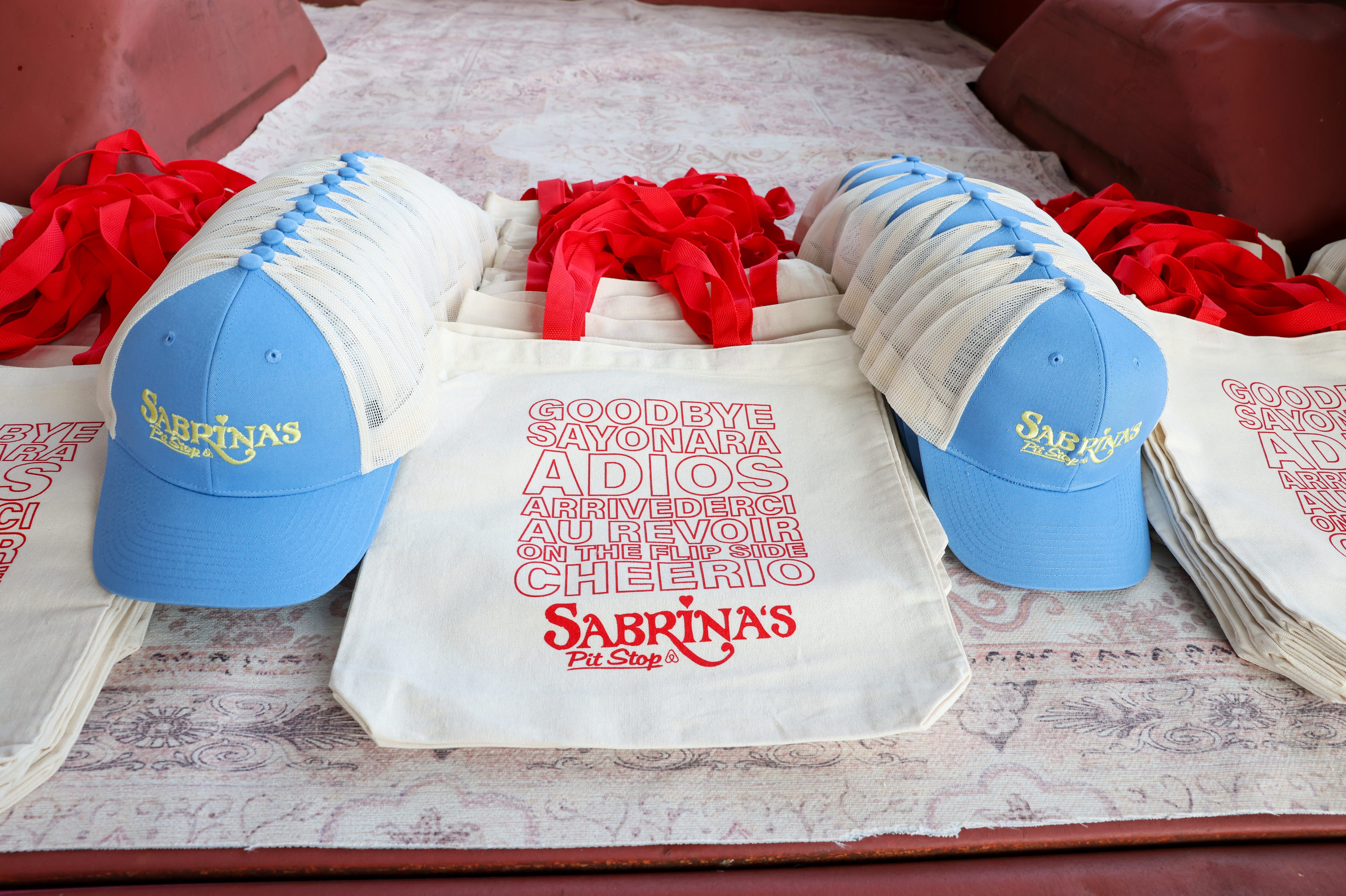 Limited‑edition merch was available at “Sabrina’s Pit Stop” presented by Airbnb and Sabrina Carpenter.