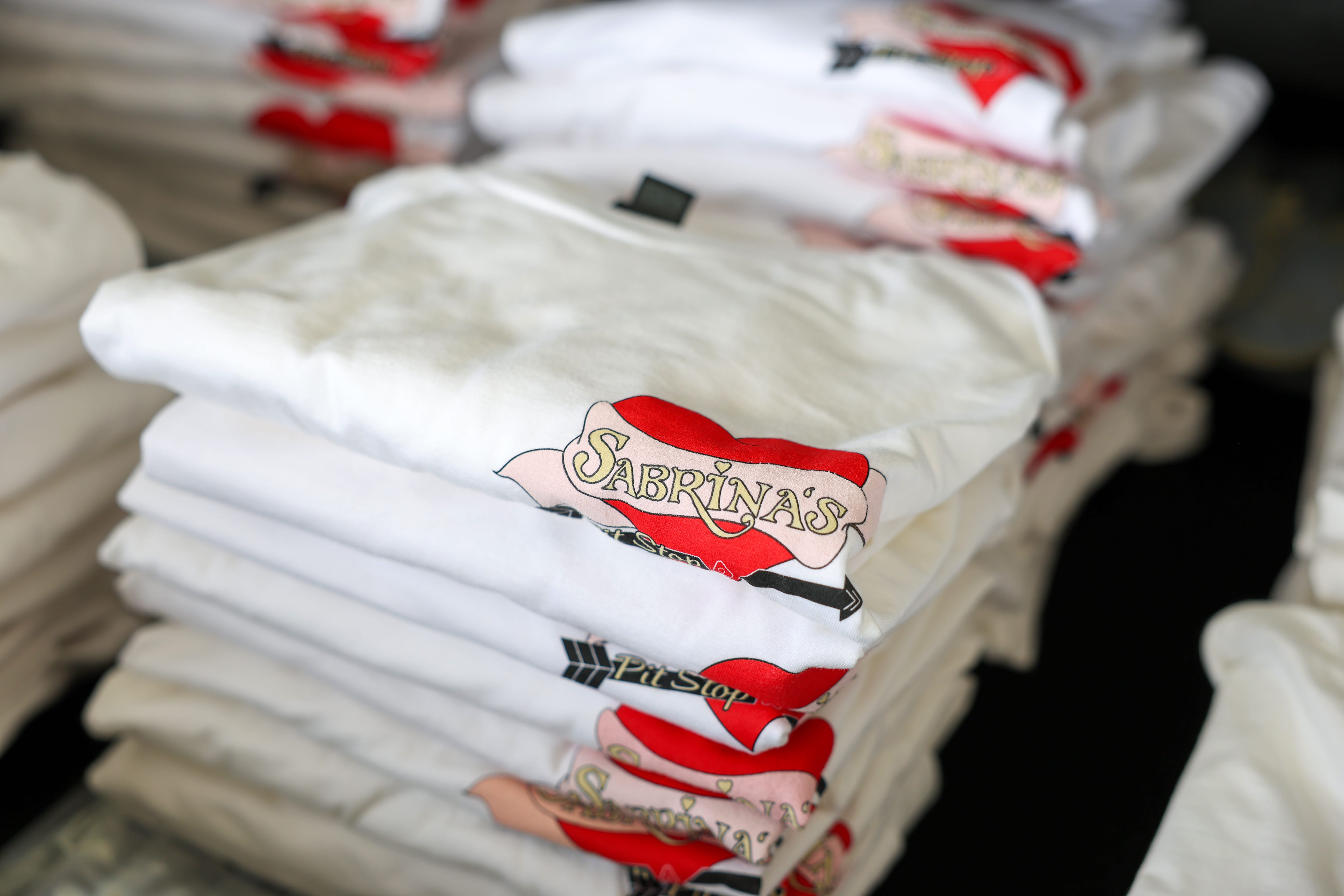 Limited‑edition merch was available at “Sabrina’s Pit Stop” presented by Airbnb and Sabrina Carpenter in Indio, California.