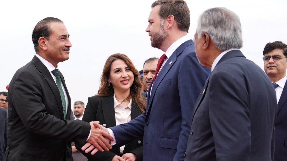 U.S. Vice President JD Vance shakes hands with Pakistan's Chief of Defence Forces and Chief of Army Staff Field Marshall Asim Munir as Charge d'Affaires of the U.S. Embassy in Islamabad Natalie A. Baker and Pakistani Deputy Prime Minister and Foreign Minister Mohammad Ishaq Dar look on, after arriving for talks with Iranian officials in Islamabad, Pakistan, Saturday, April 11, 2026.