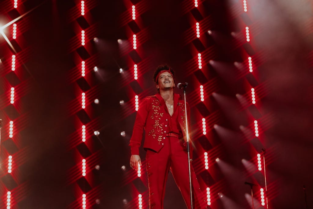 Bruno Mars returned to the stage in a massive way with The Romantic Tour. Here are the songs he performed for sold-out stadium crowds.