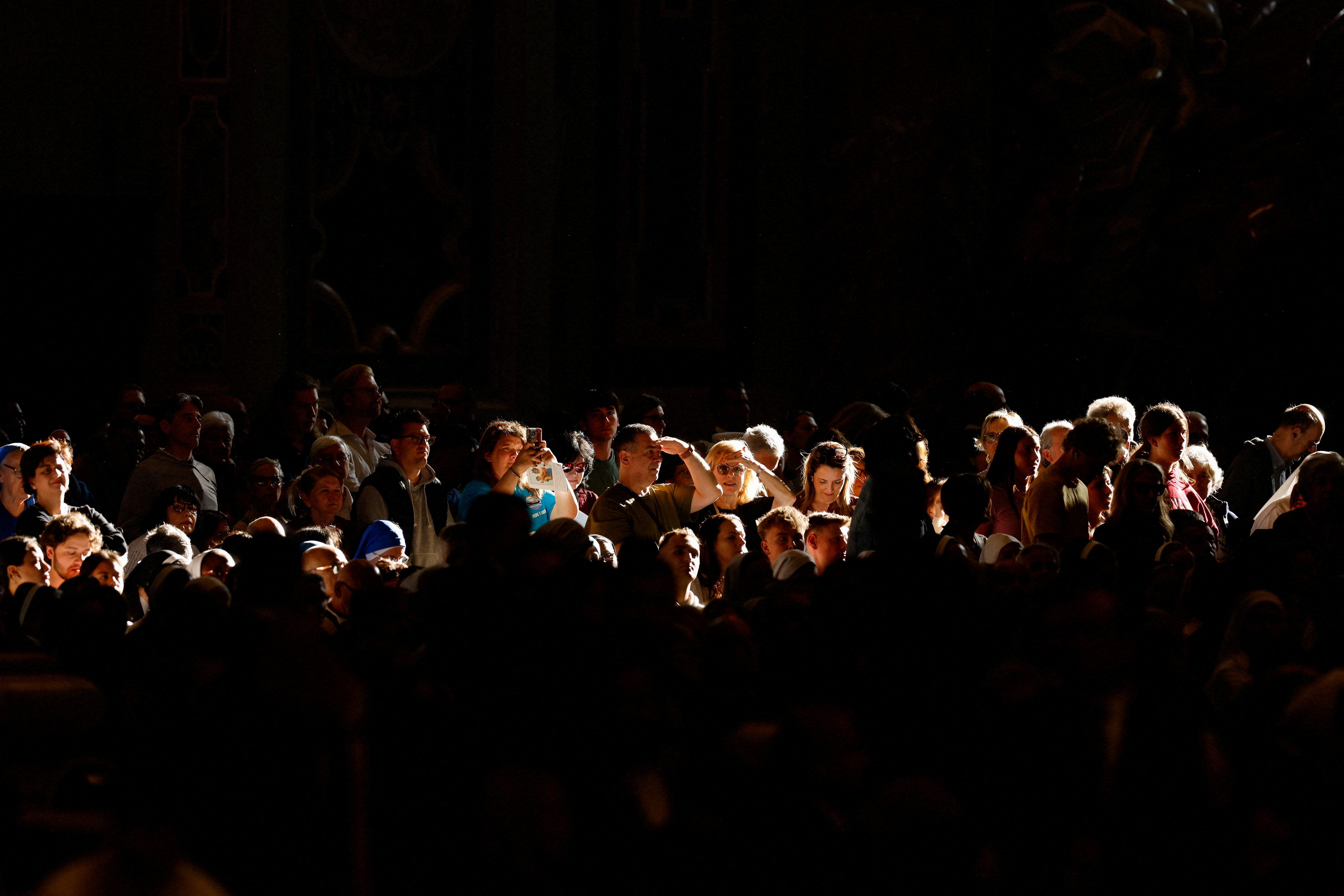 Pope Leo holds peace vigil as US, Iran negotiate an end to the war