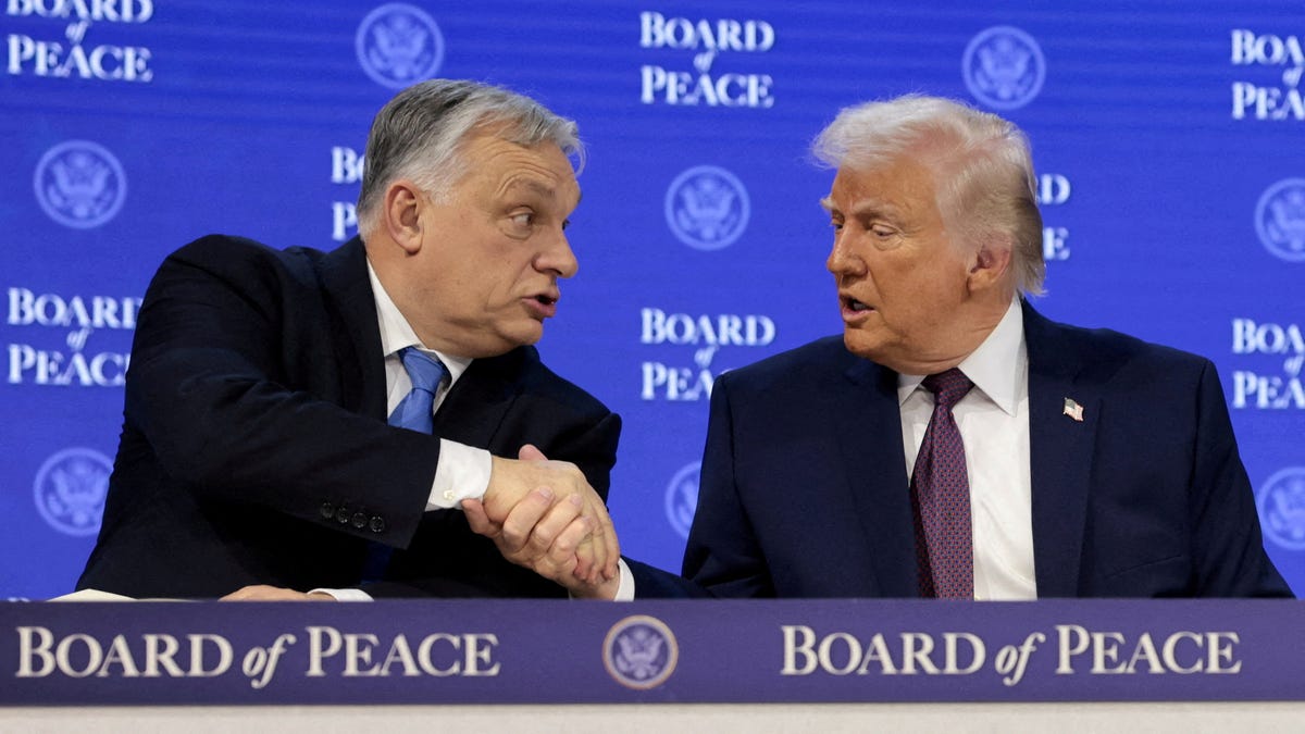 President Donald Trump shakes hands with Hungary's Prime Minister Viktor Orbán as they take part in an announcement for Trump's Board of Peace initiative aimed at resolving global conflicts, in Davos, Switzerland, on Jan. 22, 2026.