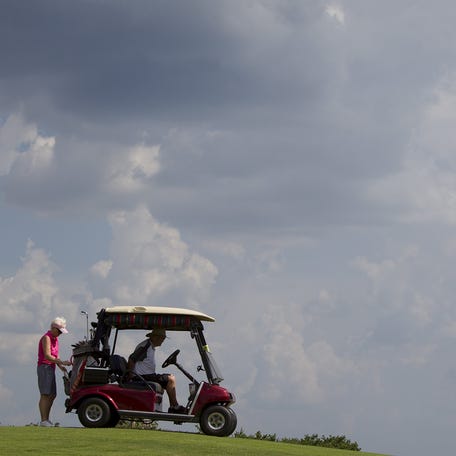 People play golf at the world's largest retirement community The Villages in Central Florida June 18, 2015. Green carpets of golf are threaded throughout the community with about 600 holes over 45 courses, where residents play for free. REUTERS/Carlo Allegri TPX IMAGES OF THE DAYPICTURE 14 OF 18 FOR WIDER IMAGE STORY "THE VILLAGES"SEARCH "CARLO VILLAGES" FOR ALL IMAGES TPX IMAGES OF THE DAY