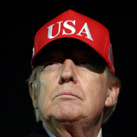 President Donald Trump disembarks Air Force One as he arrives at Joint Base Andrews in Maryland on April 12, 2026.