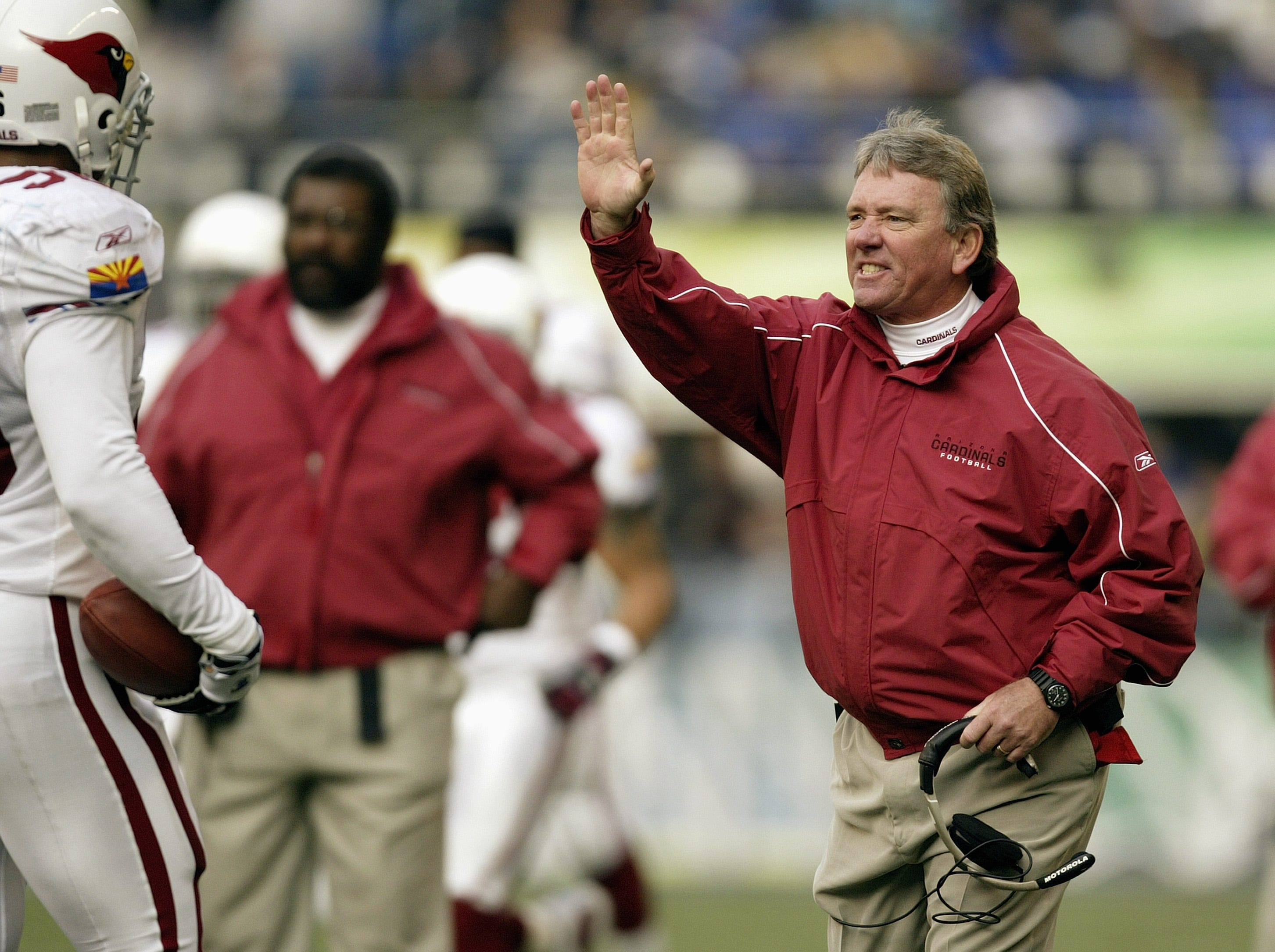 Former Arizona Cardinals coach and Tennessee Titans radio analyst Dave McGinnis died Monday at 74, the Titans said.