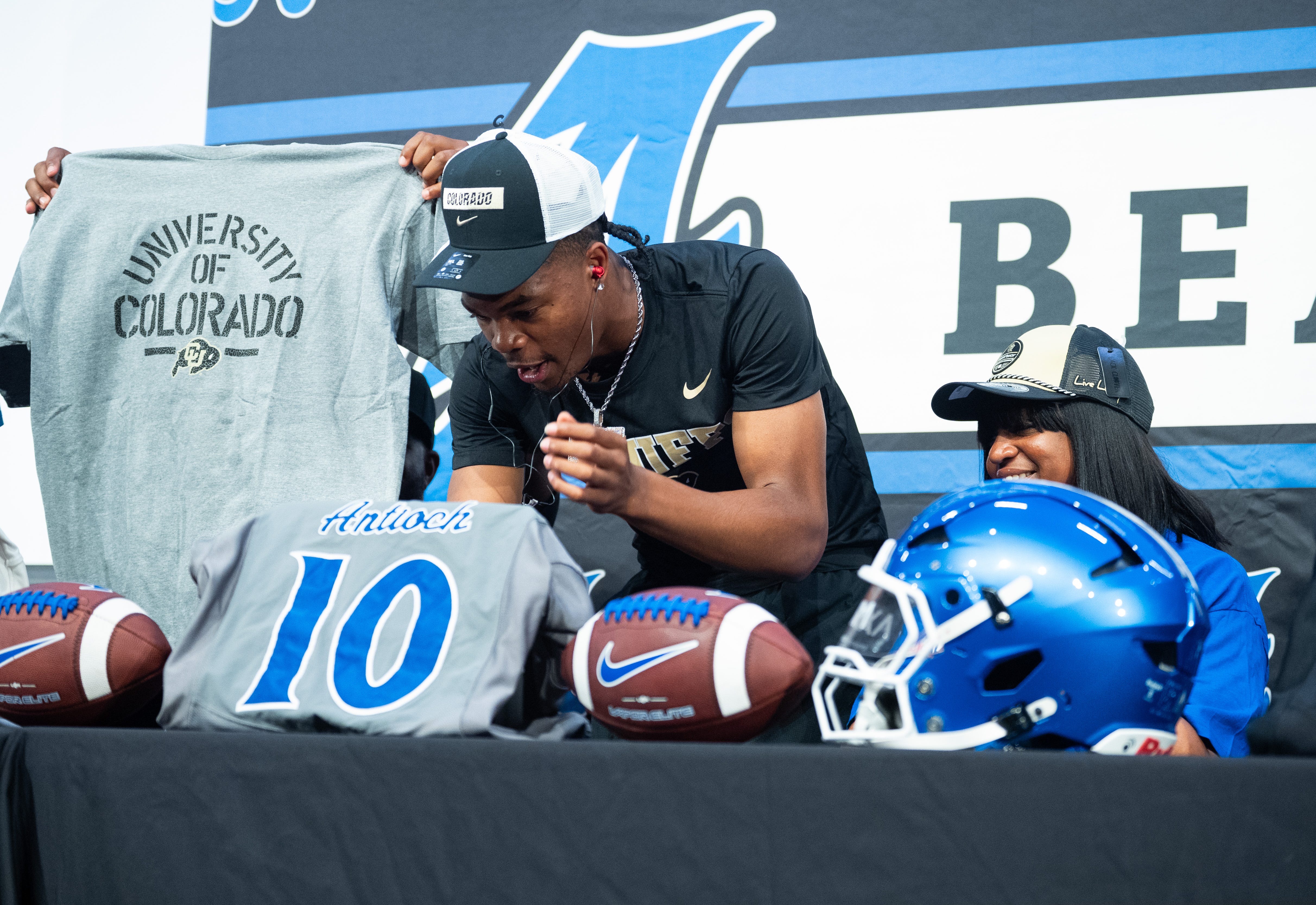 Colorado and Deion Sanders weren't the highest bidders for four-star high school quarterback recruit Andre Adams. So how did they earn his commitment?