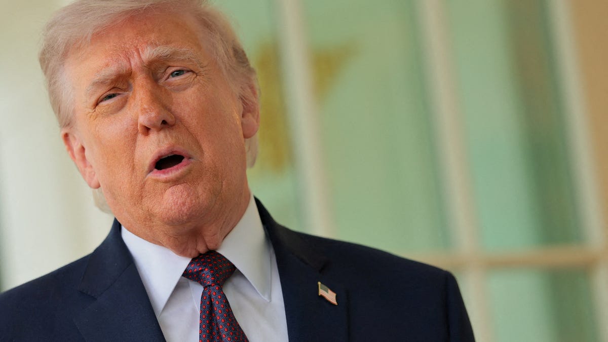 U.S. President Donald Trump speaks with the media after receiving a McDonald's order via DoorDash, which was delivered to him in front of the Oval Office at the White House in Washington, D.C., U.S., April 13, 2026.