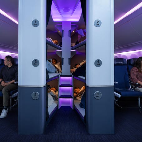 Air New Zealand's soon-to-be-introduced Skynest will allow up to 12 economy passengers a four hour resting shift in a flat bed on flights between Auckland and New York. Access will cost $495 in addition to the price of the ticket, and can be booked on a first-come, first-served basis. The airline's CEO said it's a chance for Air New Zealand to innovate and "win on sleep" for economy passengers on long-haul flights.