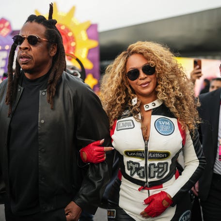 LAS VEGAS, NEVADA - NOVEMBER 22: Jay-Z and Beyonce arrive in the Paddock prior to the F1 Grand Prix of Las Vegas at Las Vegas Strip Circuit on November 22, 2025 in Las Vegas, Nevada. (Photo by Alex Bierens de Haan/Getty Images)