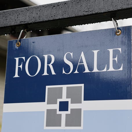 A 'For Sale' sign is posted in front of a home for sale on March 05, 2025 in Pasadena, California. The average 30-year fixed mortgage rate is down to 6.19 percent, the lowest rate since October.