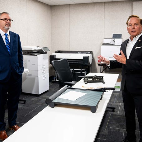 Iowa Secretary of State Paul Pate and Polk County Auditor Jamie Fitzgerald provide a tour of the new election office on April 15, 2026, at the Polk County Election Office.
