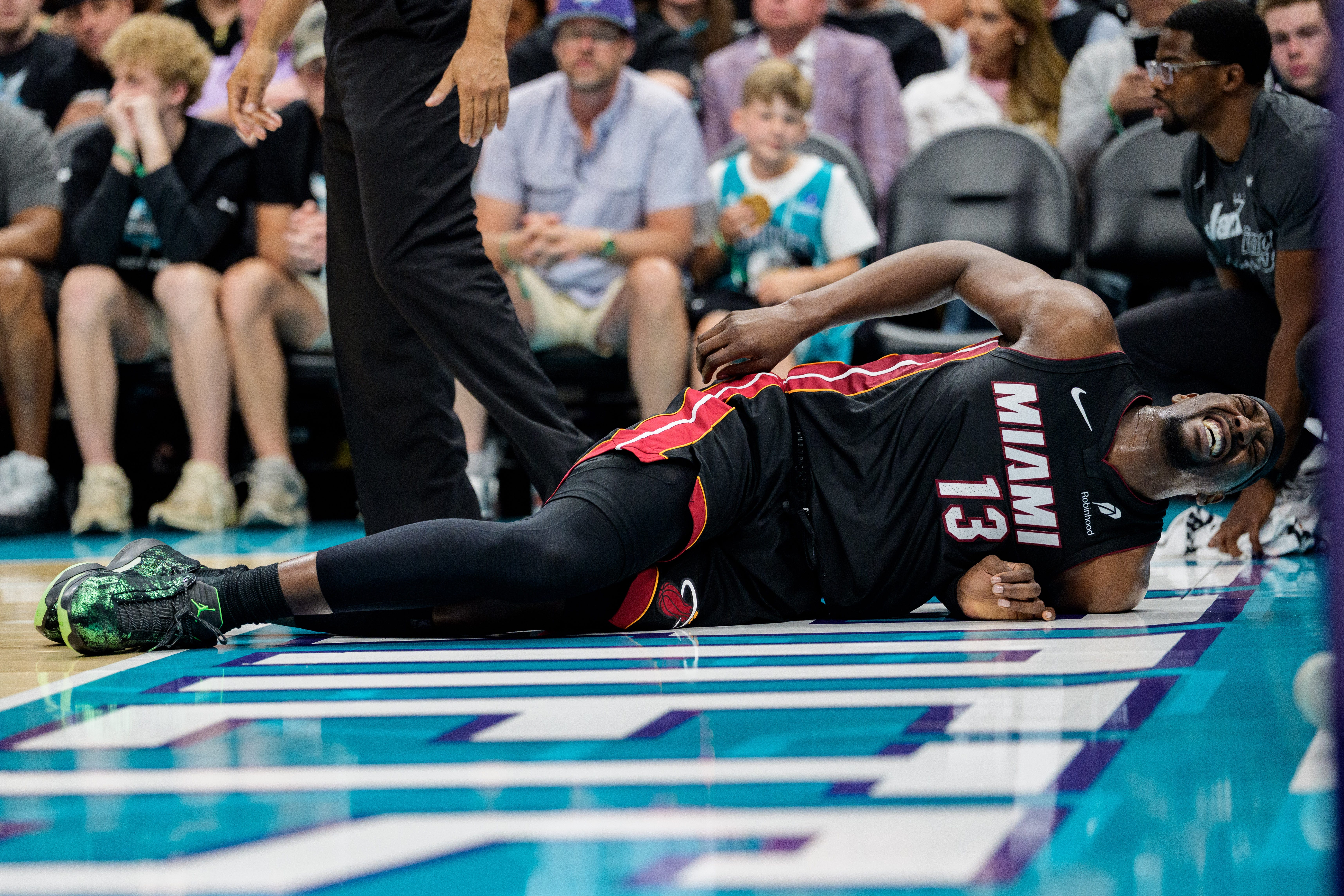 Bam Adebayo missed the entire second half of the Miami Heat's loss to the Charlotte Hornets after taking a hard fall.